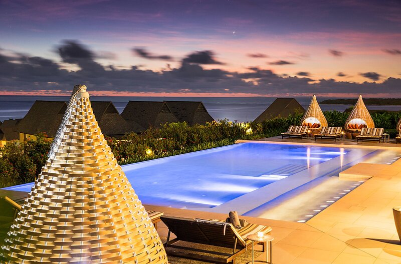 Infinity Pool at Resort — Blue, Serene, Sunset, Photograph, Cabanas