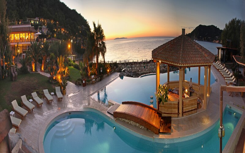 Infinity Pool at Resort — Blue, Serene, Sunset, Photograph