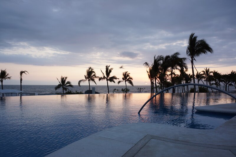 infinity pool at sunset