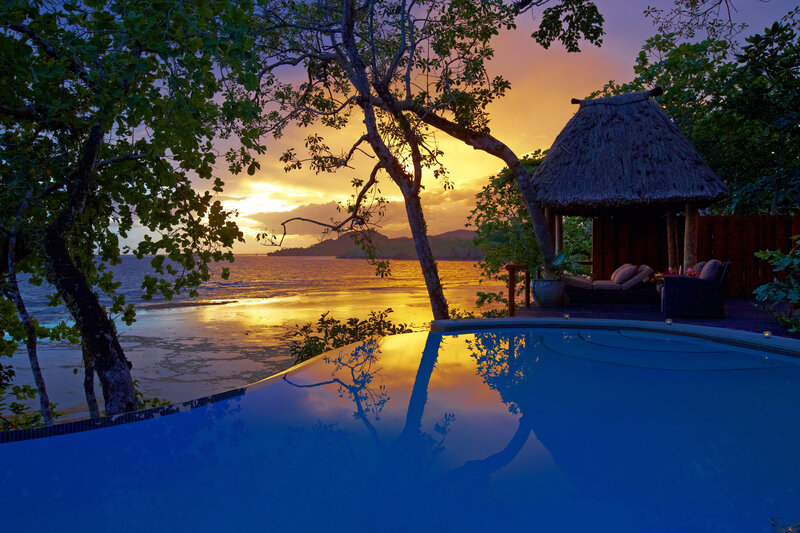 Infinity Pool at Sunset — Blue, Serene, Photograph, Ocean, Thatched Hut