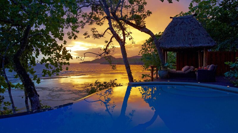 Infinity Pool at Sunset — Blue, Serene, Photograph, Ocean, Thatched Hut, Trees