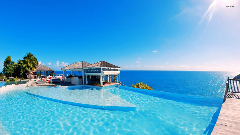Infinity Pool Overlooking Ocean — Blue, Serene, Afternoon, Photograph, Bar