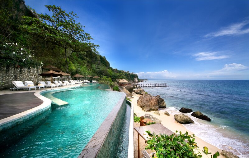 Infinity Pool Overlooking Ocean — Blue, Serene, Afternoon, Photograph, Beach