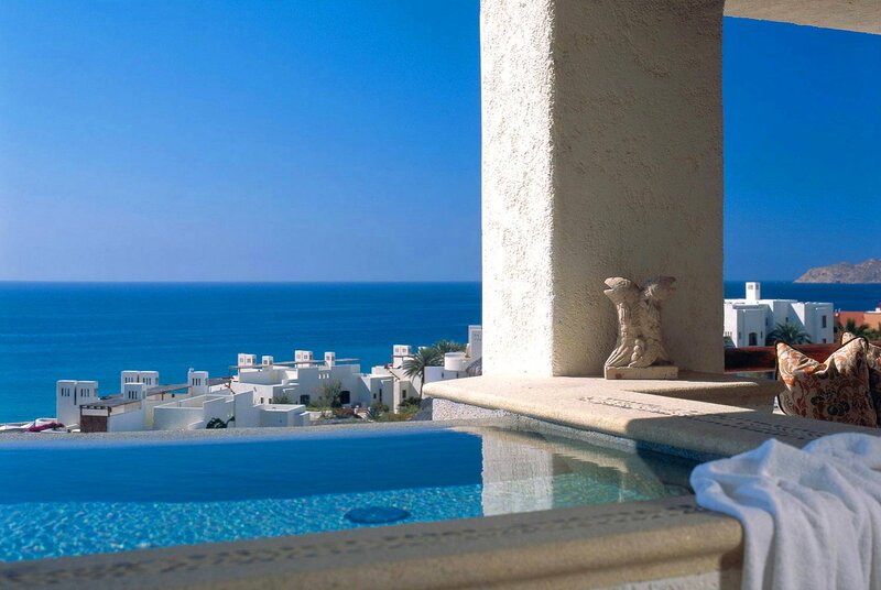 Infinity Pool Overlooking Ocean — Blue, Serene, Afternoon, Photograph, Building