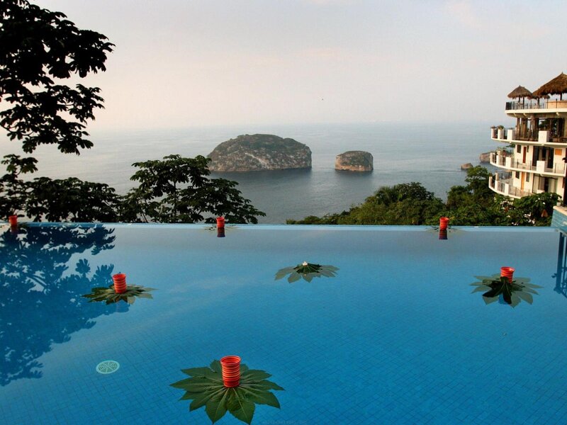 Infinity Pool Overlooking Ocean — Blue, Serene, Afternoon, Photograph, Islands
