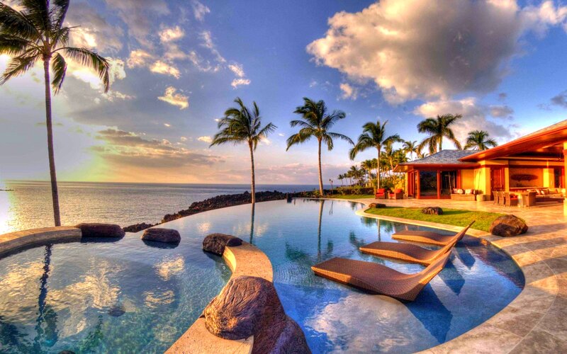 Infinity Pool Overlooking Ocean — Blue, Serene, Sunset, Photograph, Palm Trees