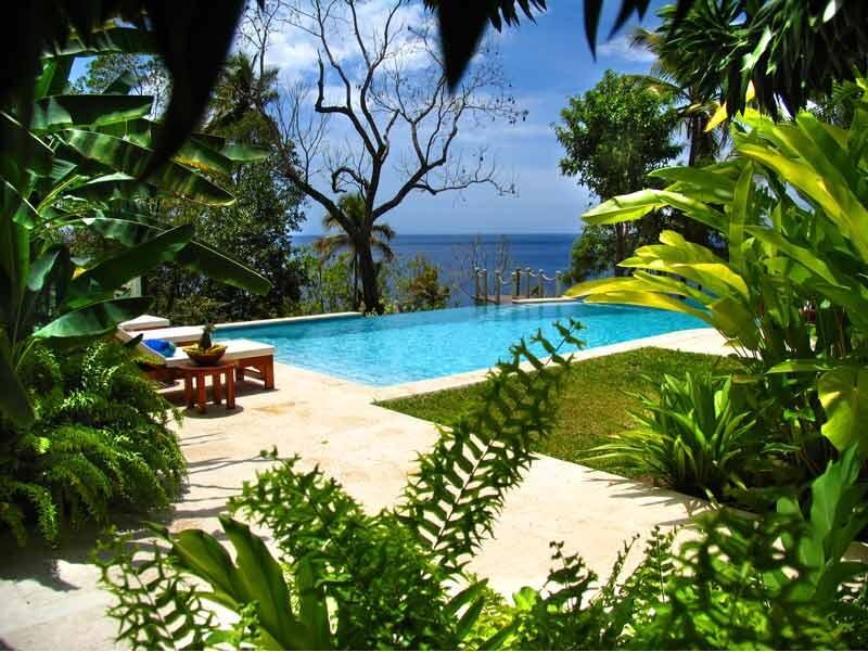 Infinity Pool Overlooking Ocean — Blue