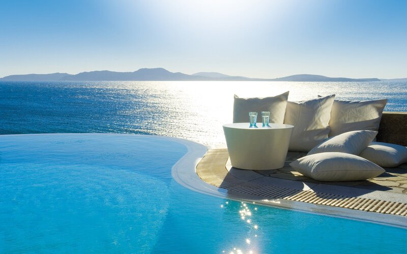Infinity Pool Overlooking Sea — Blue, Serene, Afternoon, Photograph, Pillows