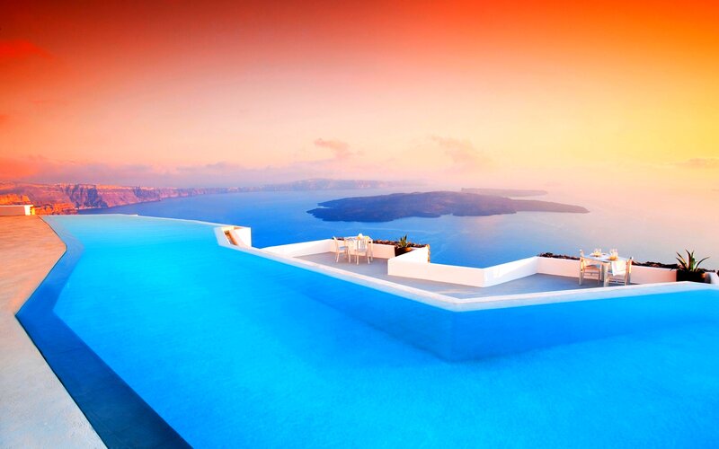 Infinity Pool Overlooking Sea — Blue, Serene, Sunset, Photograph, Island