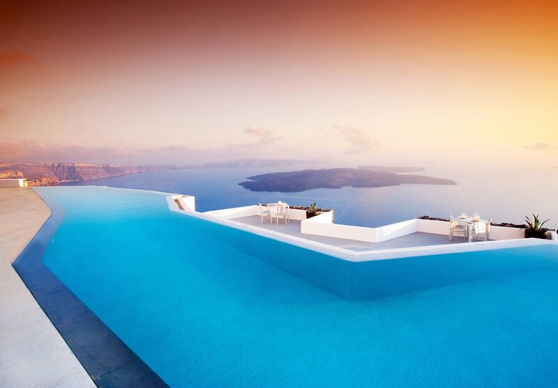 Infinity Pool Overlooking Sea — Blue, Serene, Sunset, Photograph, Tables