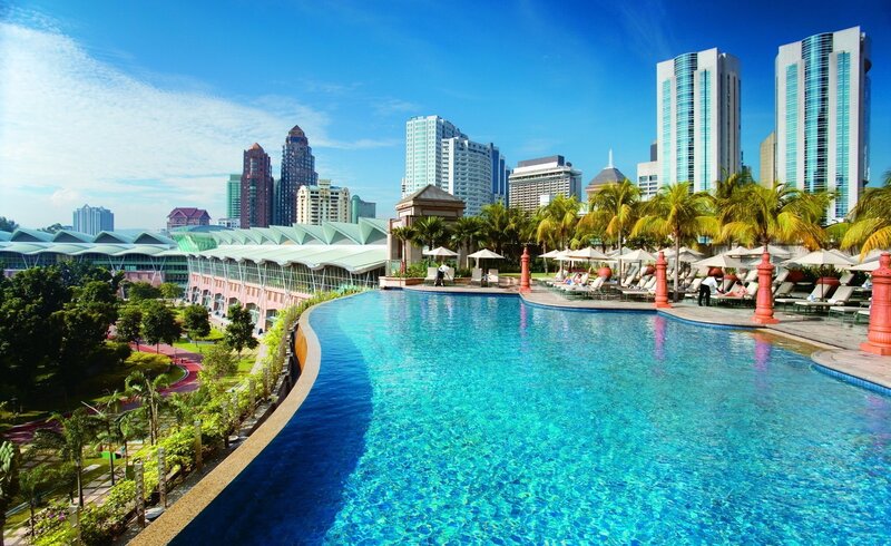 Infinity Pool with City View — Afternoon