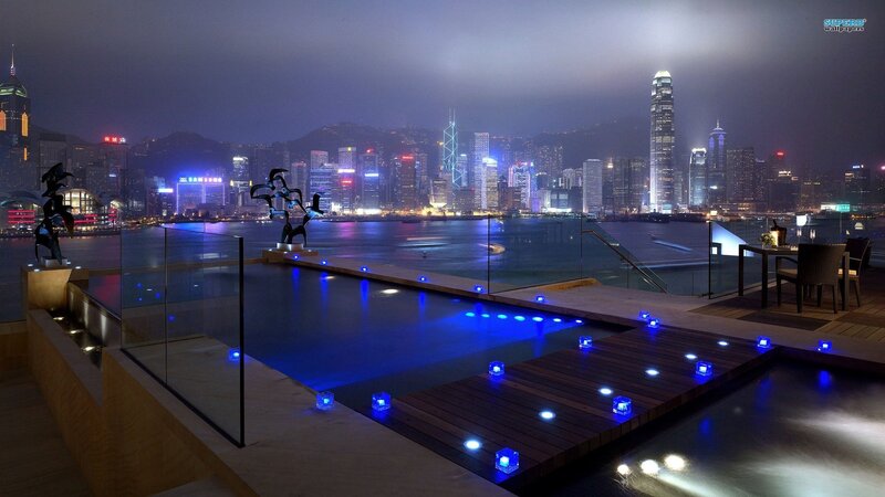 Infinity Pool with City View — Blue, Serene, Night, Photograph