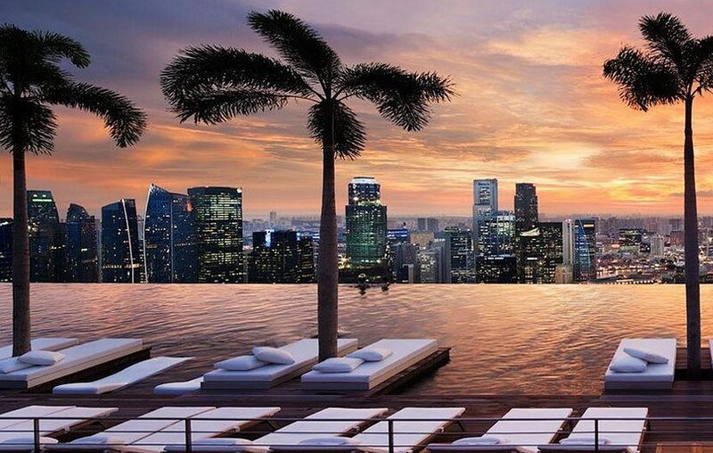 Infinity Pool with City View — Orange