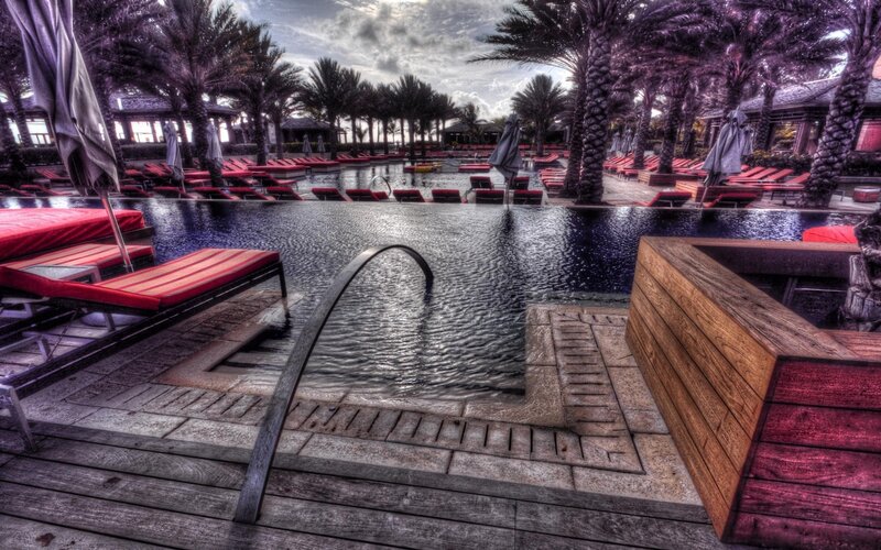 Infinity Pool with Lounge Chairs — Red, Dramatic