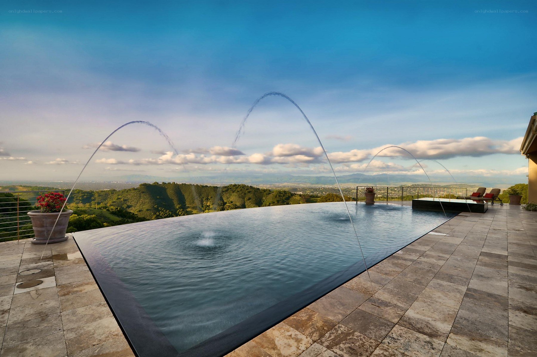 Infinity pool with water fountains