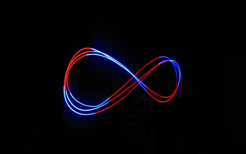 Infinity Symbol Light Trails — Red