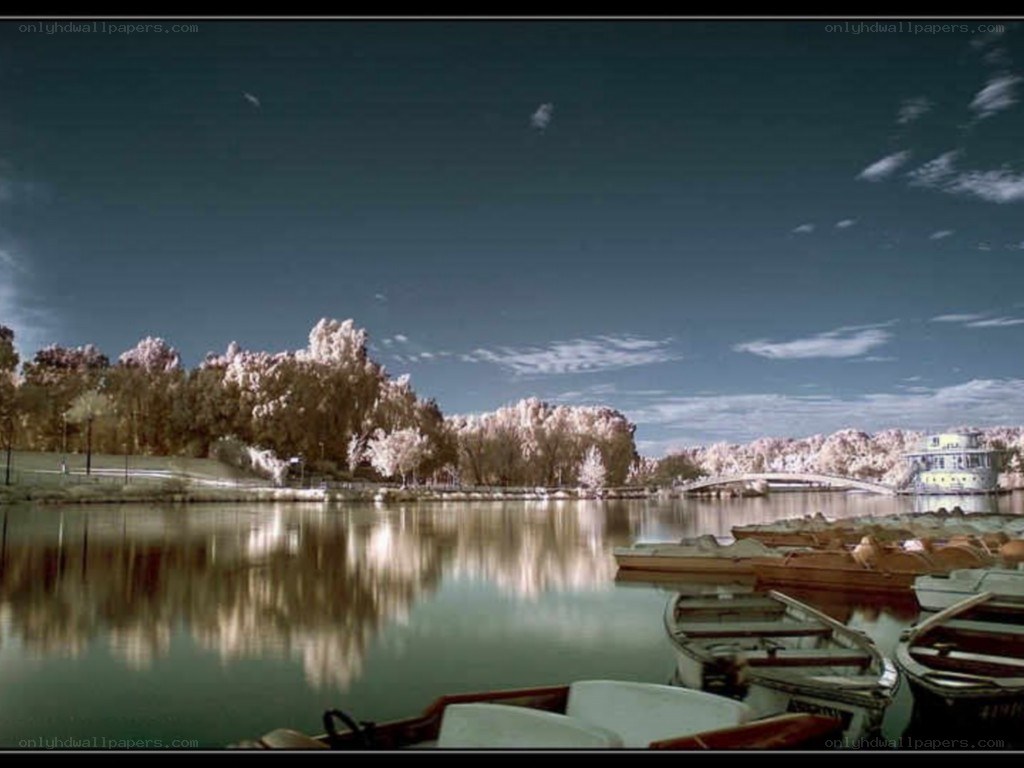 Infrared lake scene with boats