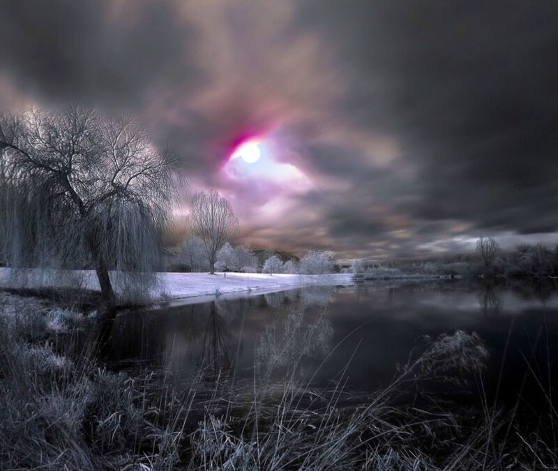 Infrared landscape with glowing moon
