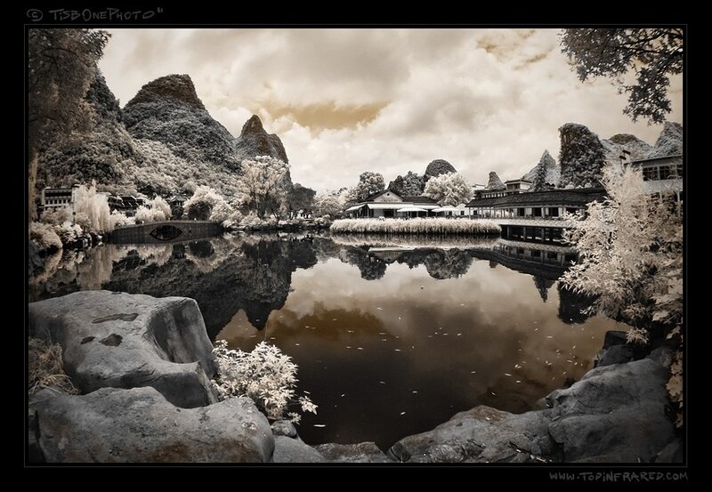 Infrared landscape with lake and mountains