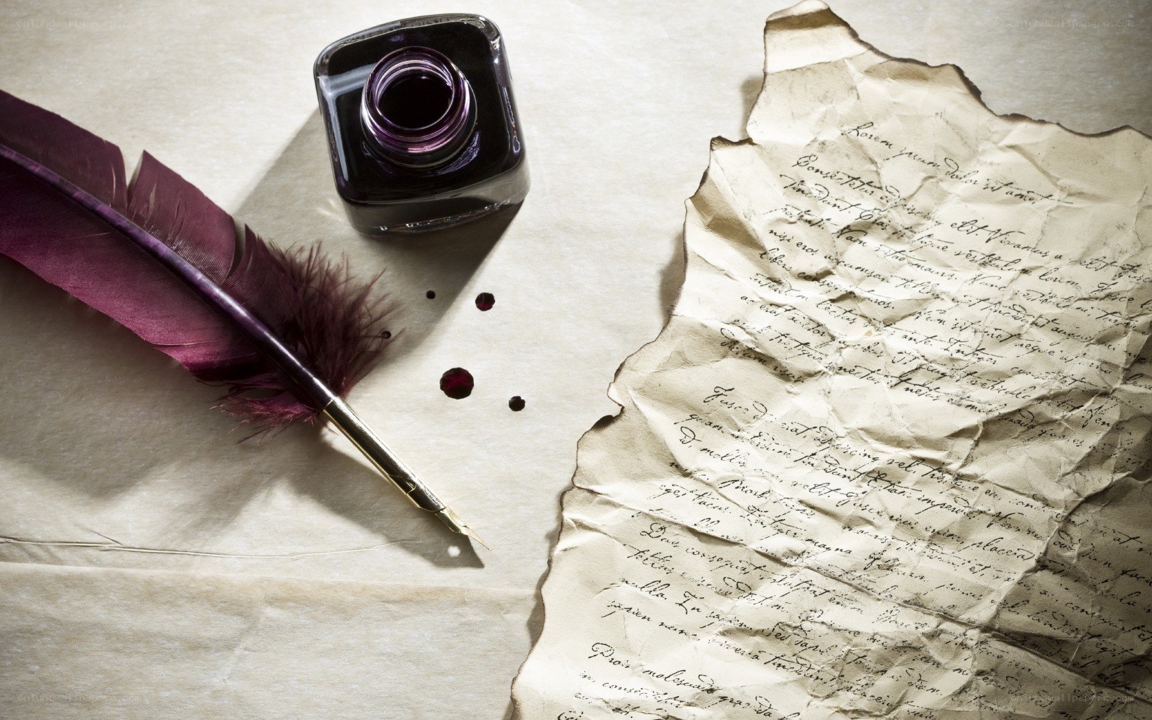 Inkwell and quill on parchment