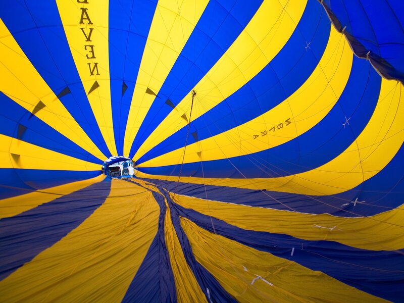 Inside a blue and yellow hot air balloon