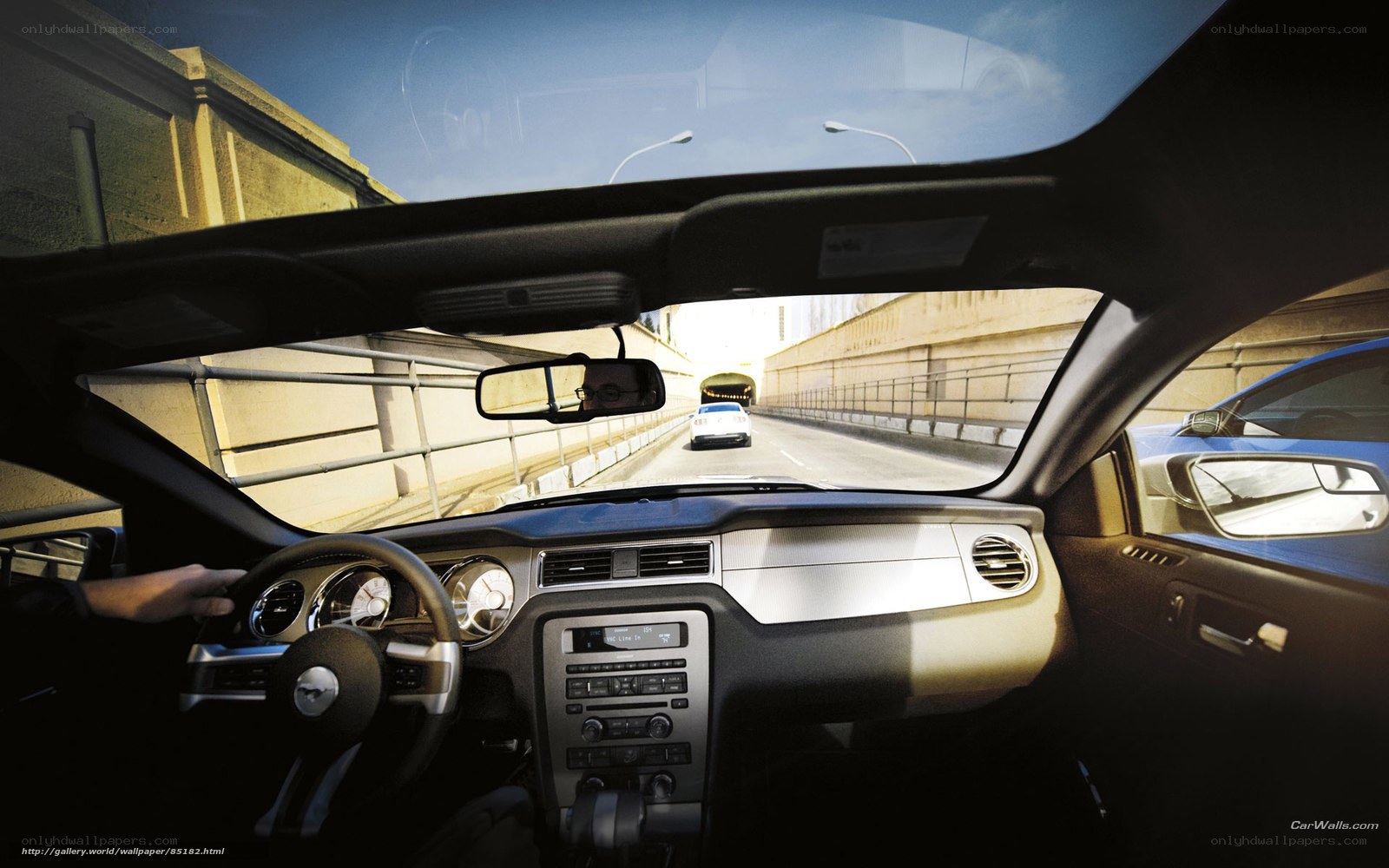 Inside a car driving through a tunnel