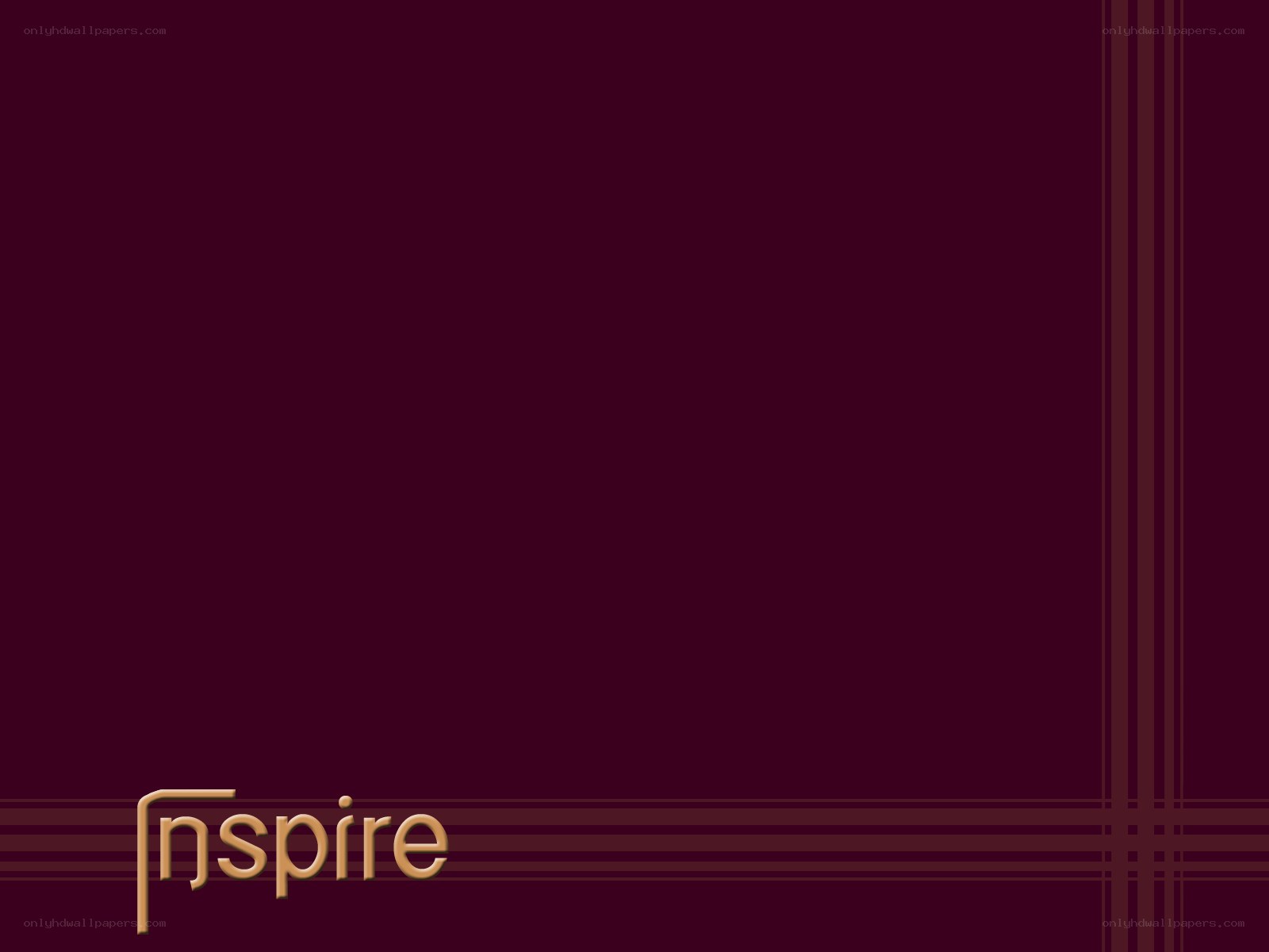 Inspire text on maroon background