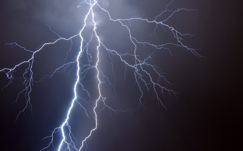 Intense lightning storm at night
