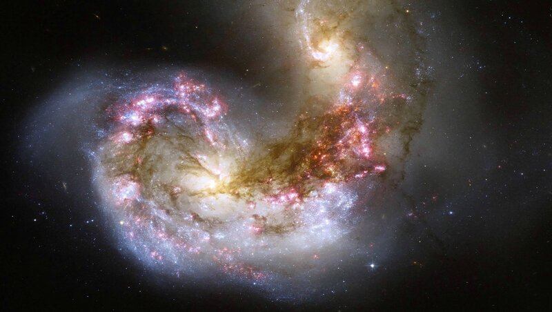 Interacting Spiral Galaxies — White, Cosmic