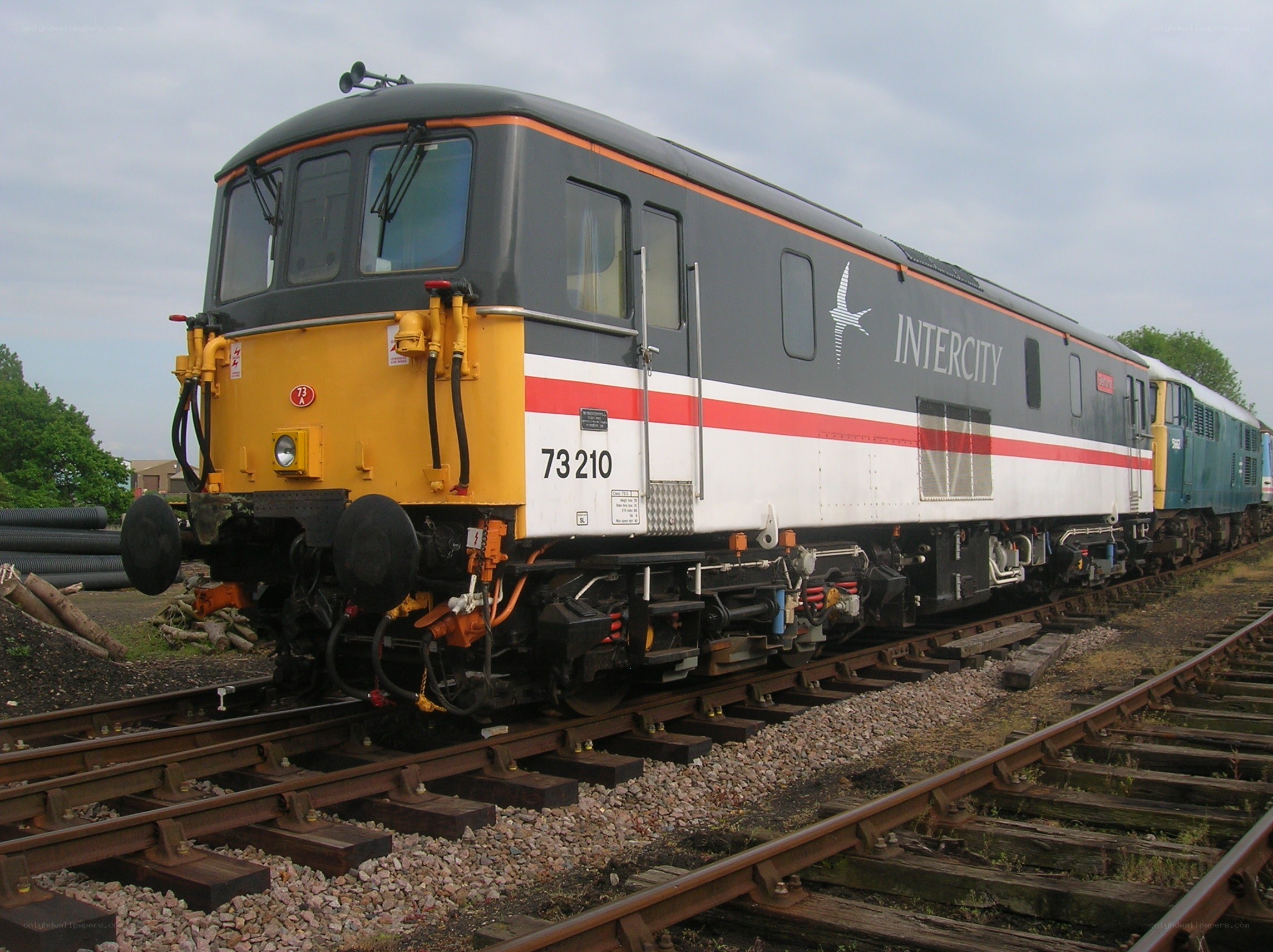 Intercity locomotive on tracks