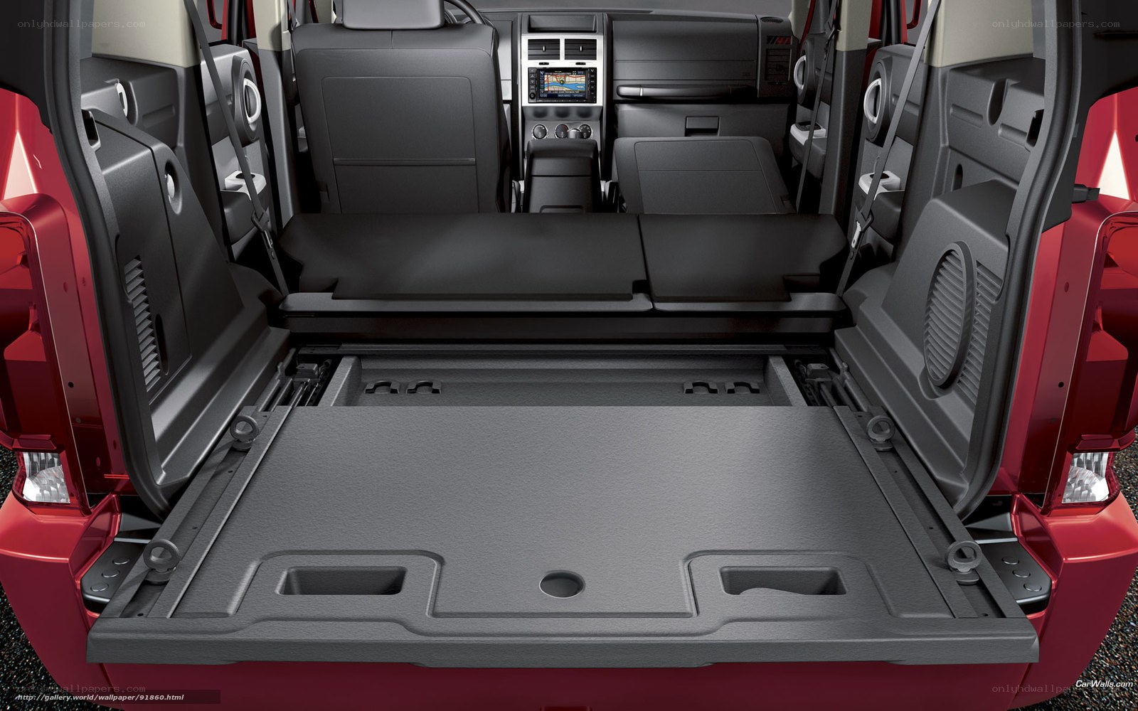 Interior cargo space of a red SUV