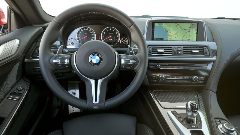 Interior of a BMW Car — Black, Modern, Photograph, Steering Wheel
