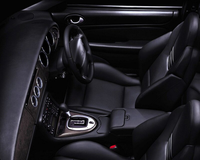 Interior of a Car — Black, Dark, Photograph, Steering Wheel, Gear Shift