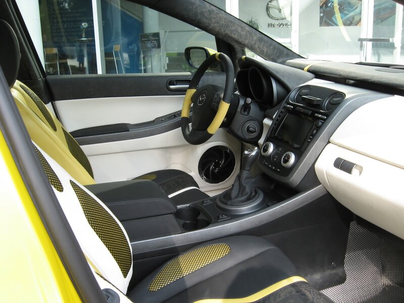 Interior of a Car — Black, Neutral, Photograph, Steering Wheel, Dashboard, Center Console