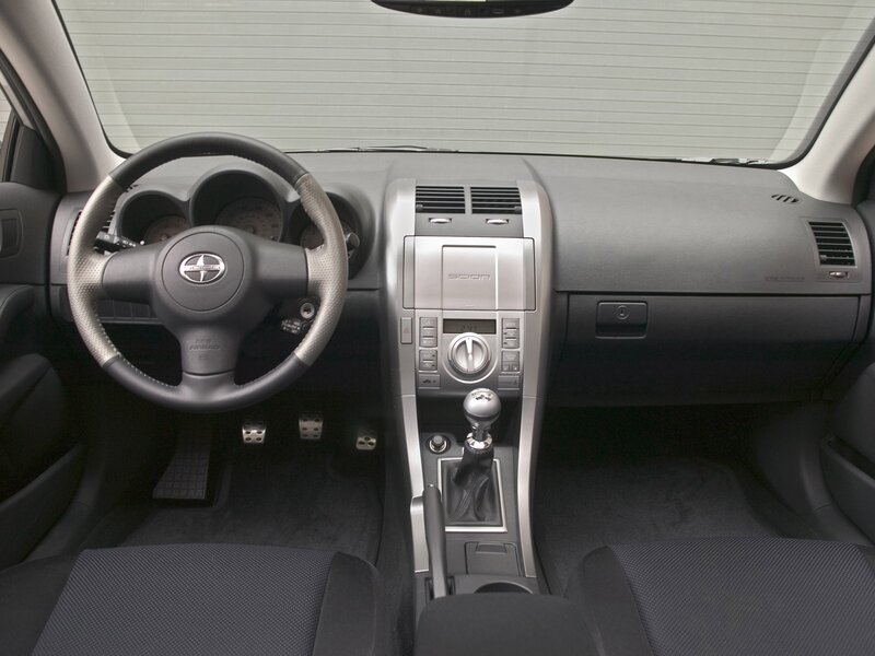Interior of a Car — Black, Neutral, Photograph, Steering Wheel, Gear Shift