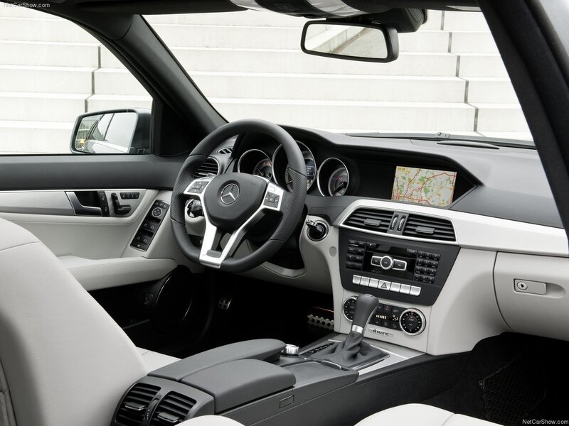Interior of a Car — Black, Neutral, Photograph, Steering Wheel