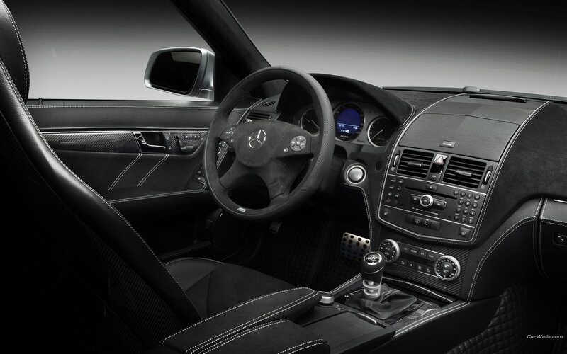 Interior of a Car — Black, Sleek, Photograph, Steering Wheel, Dashboard, Gear Shift