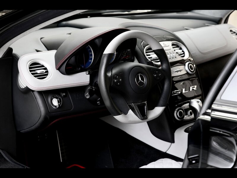 Interior of a Car — Black, Sleek, Photograph, Steering Wheel, Dashboard