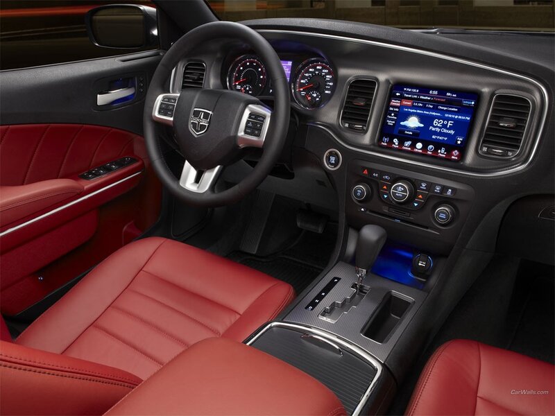 Interior of a Car — Red, Modern, Photograph, Steering Wheel, Dashboard, Center Console