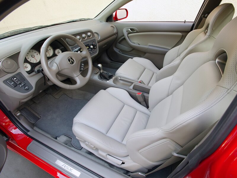 Interior of a Car — Red, Neutral, Photograph, Steering Wheel