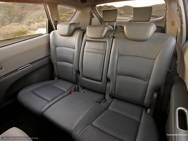 Interior of a car with three rear seats