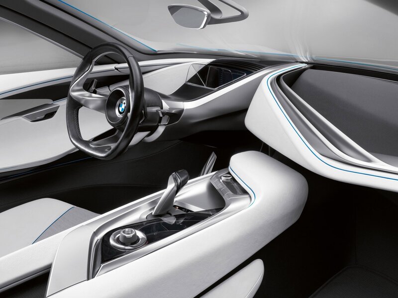 Interior of a Concept Car — White, Modern, Photograph, Steering Wheel, Center Console