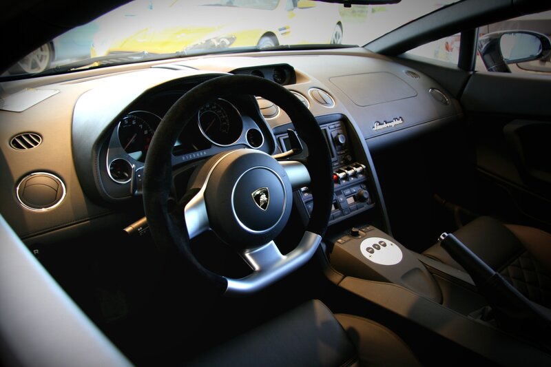 Interior of a Lamborghini — Black, Modern, Photograph, Steering Wheel