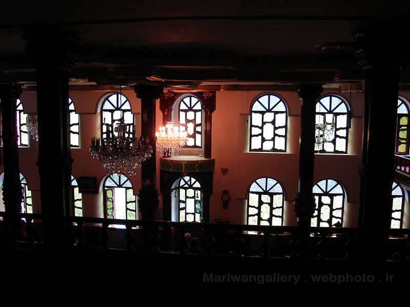 Interior of a mosque with chandeliers
