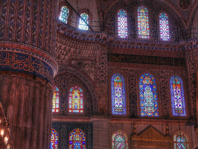 Interior of a mosque with stained glass