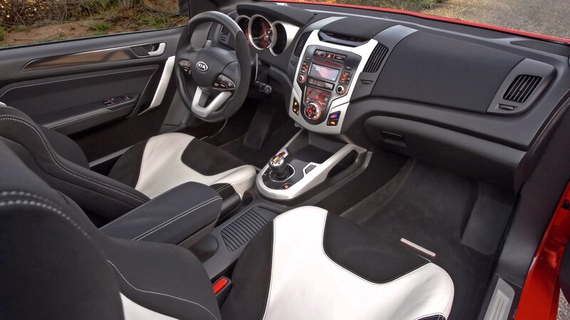 interior of a red kia car