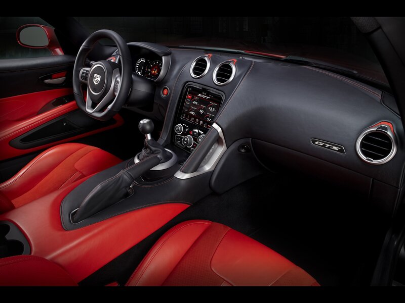 Interior of a Sports Car — Black, Dramatic, Photograph, Steering Wheel, Center Console, Red Seats