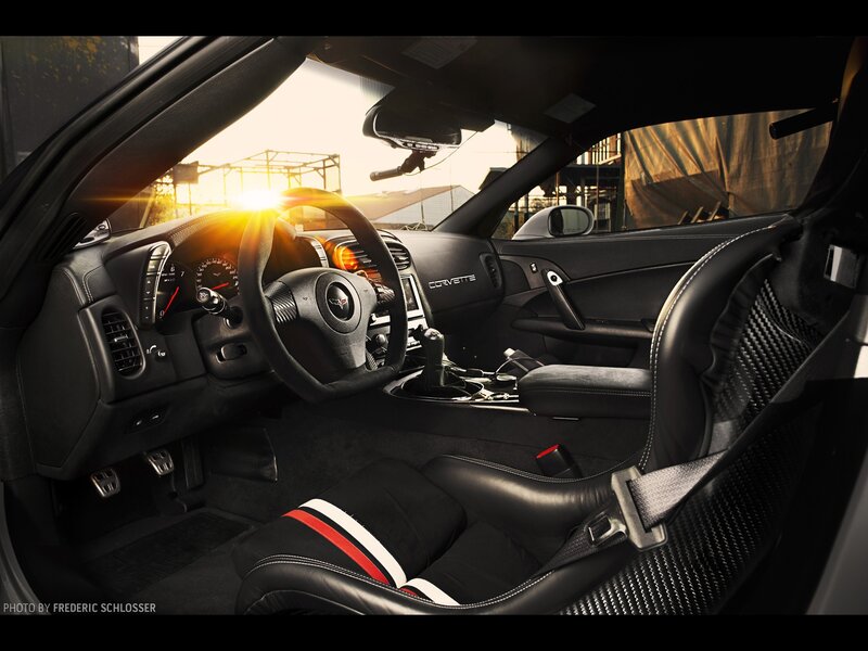 Interior of a Sports Car — Black, Dramatic, Sunset, Photograph, Steering Wheel