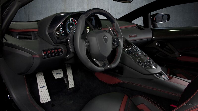 Interior of a Sports Car — Black, Modern, Photograph, Steering Wheel, Dashboard, Center Console, Red