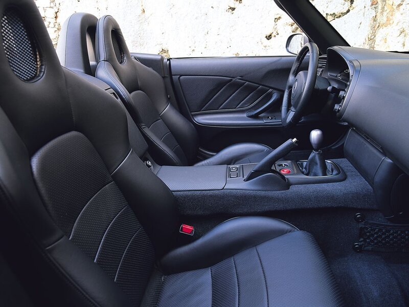 Interior of a Sports Car — Black, Neutral, Photograph, Steering Wheel, Manual Transmission